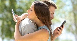 couple on phones photo via shutterstock.jpgx648y348crop1 300x161 - couple_on_phones_photo_via_shutterstock.jpgx648y348crop1.jpeg