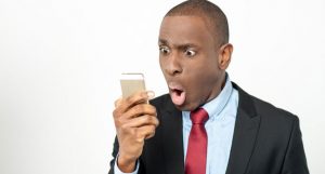 shutterstock 184661174 mobile man looking shocked 300x161 - shutterstock_184661174_mobile_man_looking_shocked.jpeg