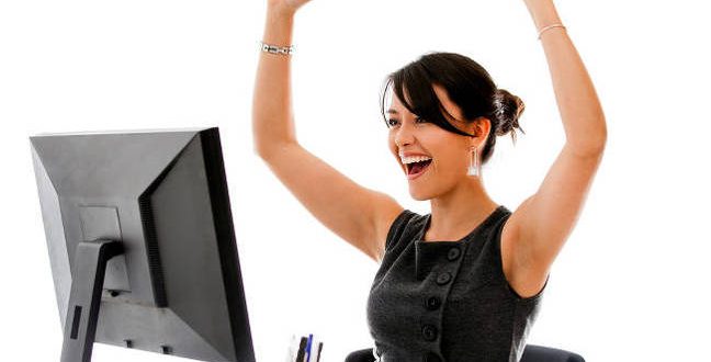 happy woman at desk 648x330 - You know this net neutrality thing? Well, people really love it