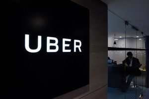 Uber signage is seen as an employee sits in the entrance of the ride hailing giants office in Hong Kong 1 300x200 - Uber-signage-is-seen-as-an-employee-sits-in-the-entrance-of-the-ride-hailing-giants-office-in-Hong-Kong-1.jpg